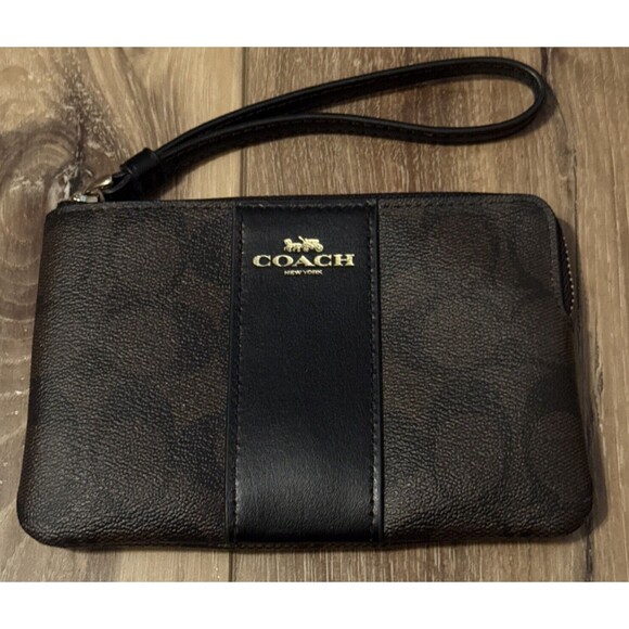 Coach Handbags - ⚪️Coach Brown & Black Corner Zip Wristlet In Signature Canvas Logo
